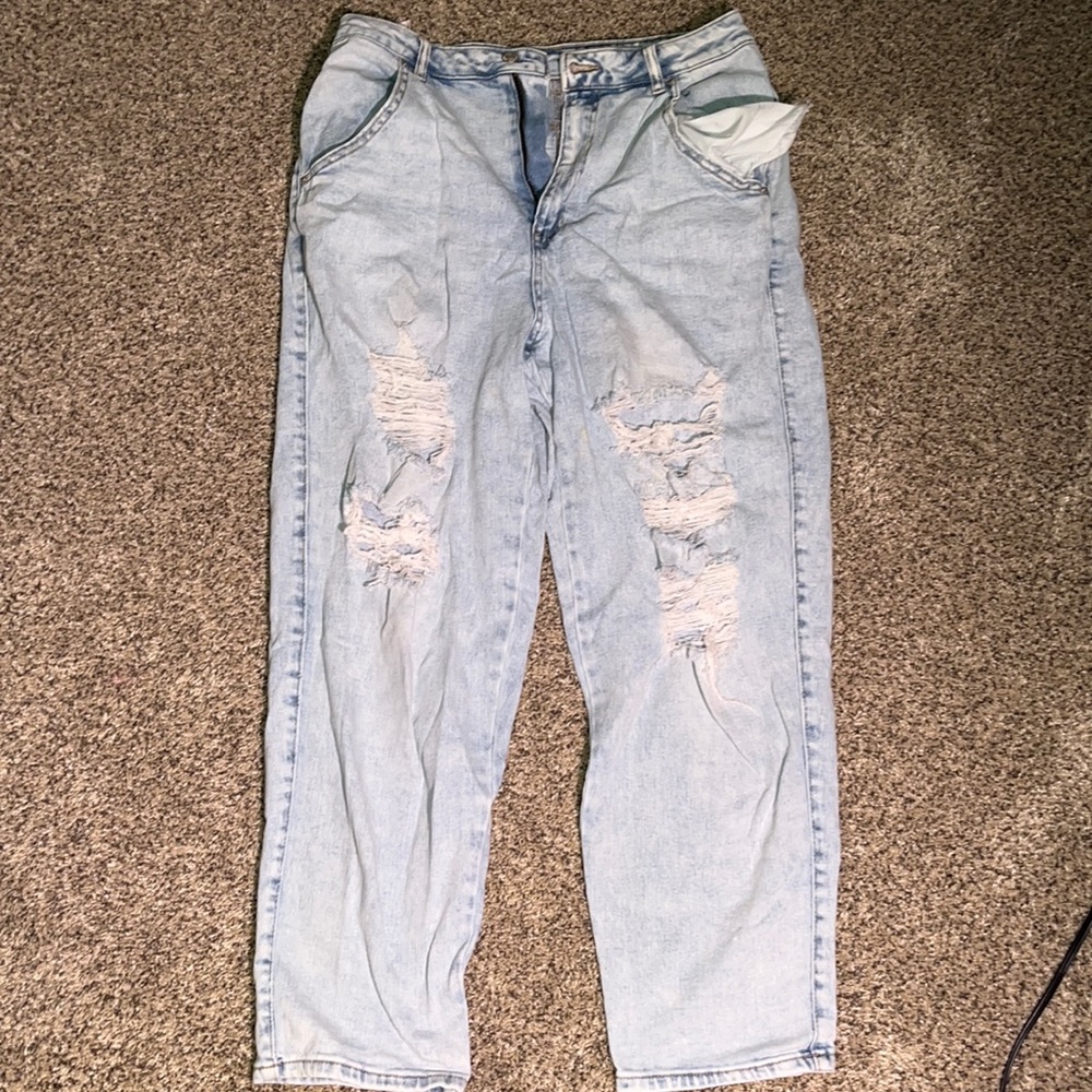 Light wash mom blue jeans with rips